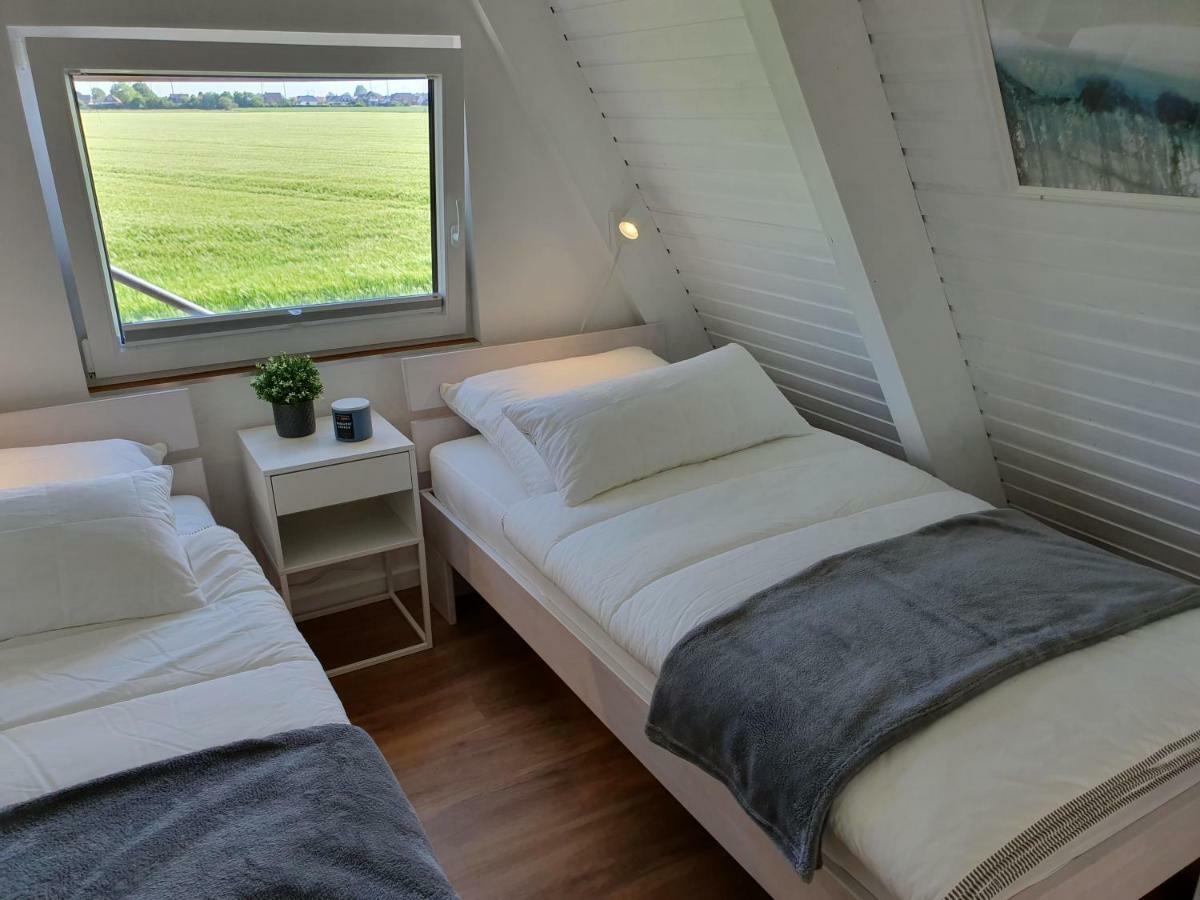 Holiday home Murmel 3 - Strandkorb, Wallbox, Wlan, Kamin Carolinensiel